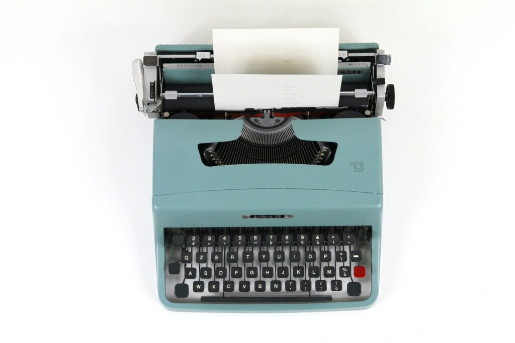 typewriter overhead view with paper